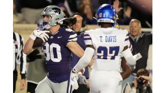K-State's Tennant makes 51-yard field goal, No. 16 team holds off Kansas 29-27 with key 4th down stop.