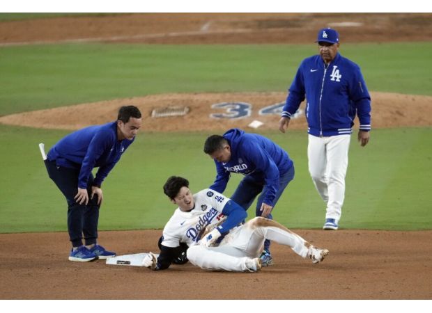 Ohtani injured shoulder in Game 2, uncertain if he can continue.