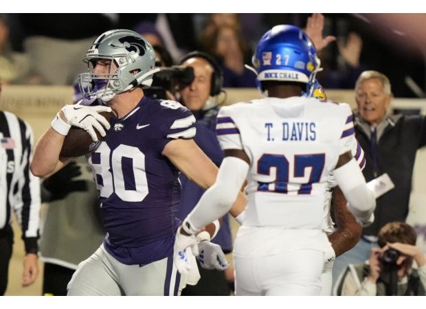 K-State's Tennant makes 51-yard field goal, No. 16 team holds off Kansas 29-27 with key 4th down stop.