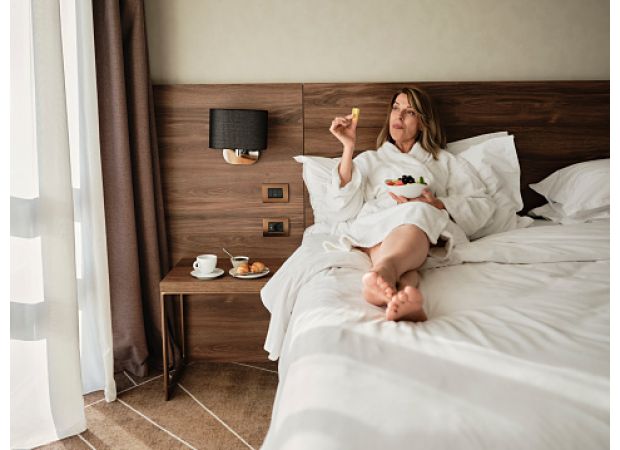 This item in your wallet can help you maintain the ideal temperature in your hotel room.