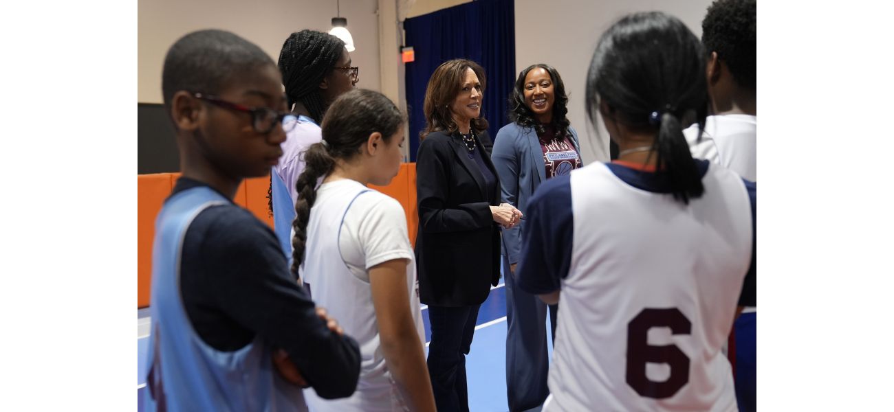 Harris urges America to move past hate and strife while traveling through Philadelphia.