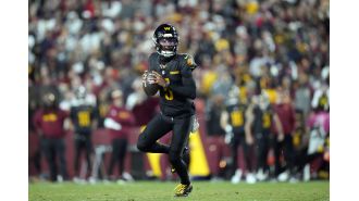 Jayden Daniels throws 52-yard Hail Mary to secure victory for Commanders against Bears.