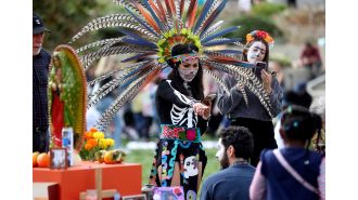 The Oakland Museum of California honors Día de los Muertos with its 30th annual celebration through photos.