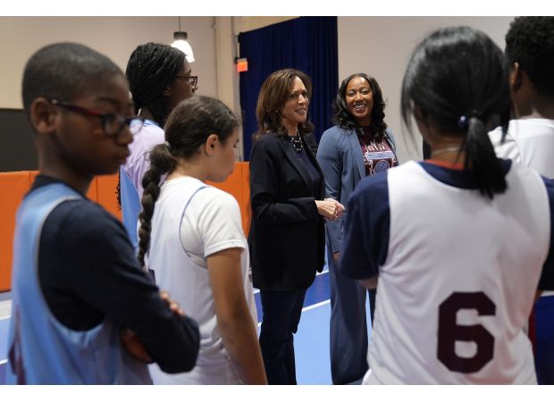 Harris urges America to move past hate and strife while traveling through Philadelphia.