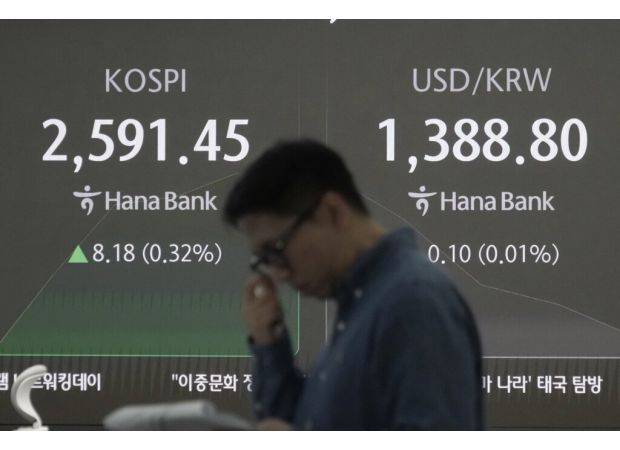 Asian stocks up, yen down as ruling party loses majority in Japan, affecting stock market.