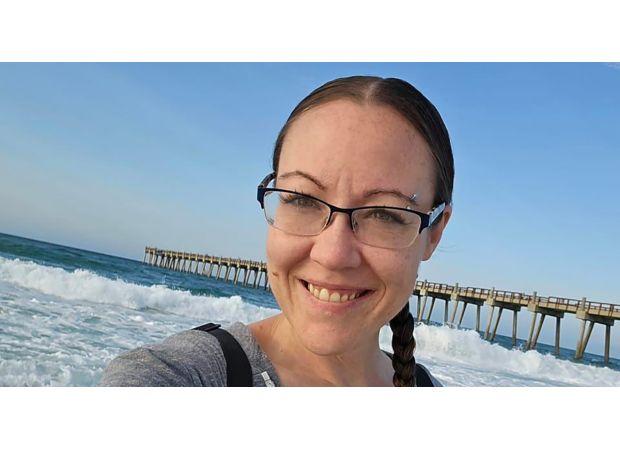 Person dies after stepping backwards into aircraft propeller while capturing images.