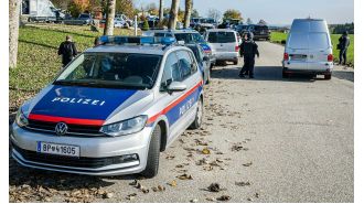 Austrian mayor killed in apparent hunting feud, police searching for suspect.