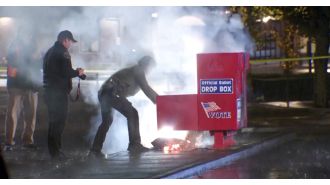 US Election has ballot boxes on fire before the intense voting period.