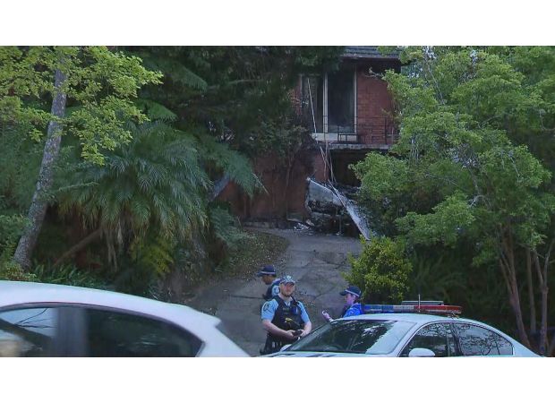 Cops probe fire that injured resident, firefighter