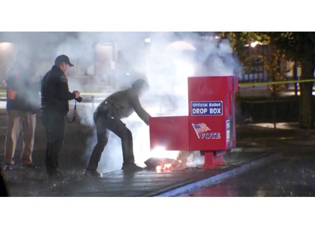 US Election has ballot boxes on fire before the intense voting period.