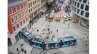 A tram in Oslo derails in a busy city center, causing it to crash into a store.