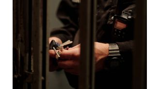 Govt. takes responsibility for prison officers stabbed and burnt during ambush