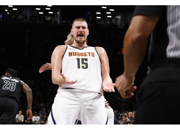 Nikola Jokic helps Nuggets win second consecutive overtime game on the road with a triple-double.