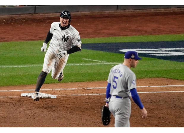 Yankees rally after Freeman's homer, Volpe's slam leads to 11-4 win over Dodgers, forcing Game 5 of World Series.