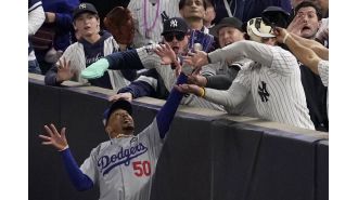 Mookie Betts speaks out against fan who attempted to steal ball from him during World Series game.