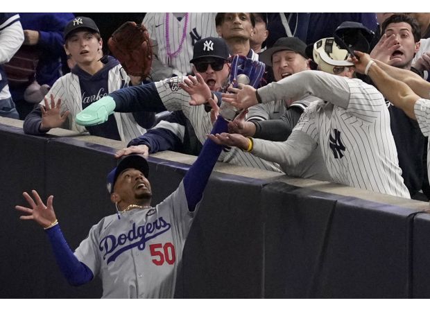 Mookie Betts speaks out against fan who attempted to steal ball from him during World Series game.