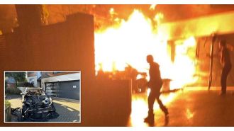 An expensive electric car caught fire on a family's driveway.