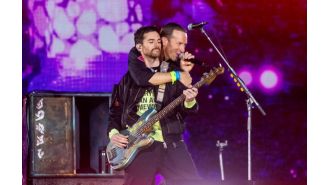 Coldplay performs without one member after they suffered a health emergency for the first time ever.