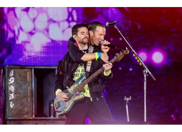 Coldplay performs without one member after they suffered a health emergency for the first time ever.