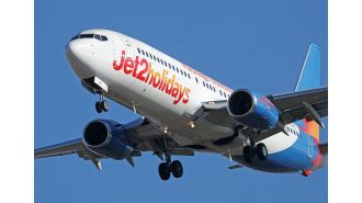 An airplane was forced to return when passengers became sick from a strong smell resembling burning.