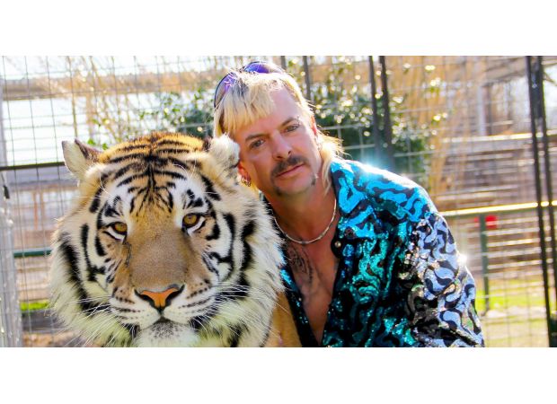 Exotic from Tiger King announces engagement to much younger man while still in prison.