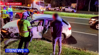 A young driver avoids harm as their vehicle overturns multiple times on a Sydney freeway.