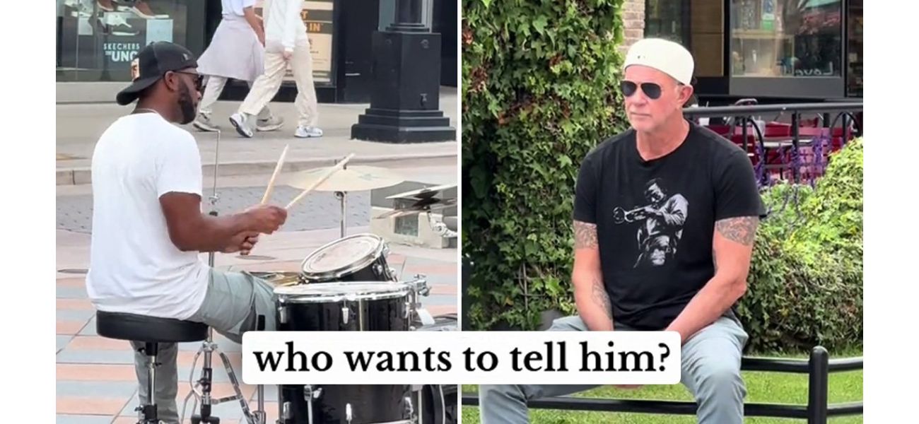 Street performer jams to RHCP but doesn't know the drummer is watching.