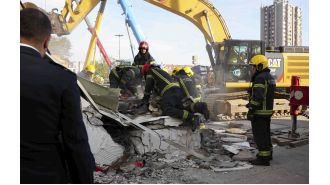13 people die in Serbian train station roof collapse.