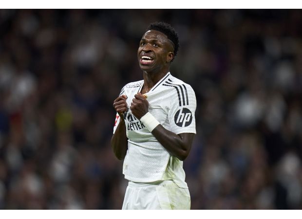 Soccer great Gary Neville criticizes Vinicius Jr for disrespectful response to Rodri winning Ballon d'Or.