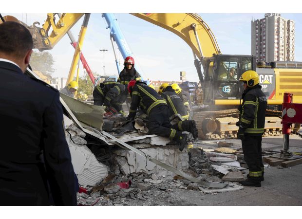 13 people die in Serbian train station roof collapse.