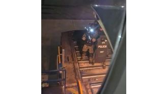 A SWAT team responds to a plane after passengers report hearing a strange noise at 30,000 feet.