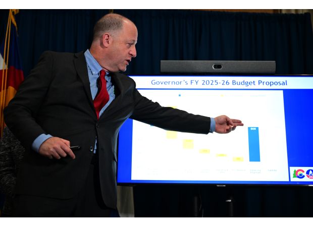 Colorado governor aims to fill $640 million deficit with budget cuts.