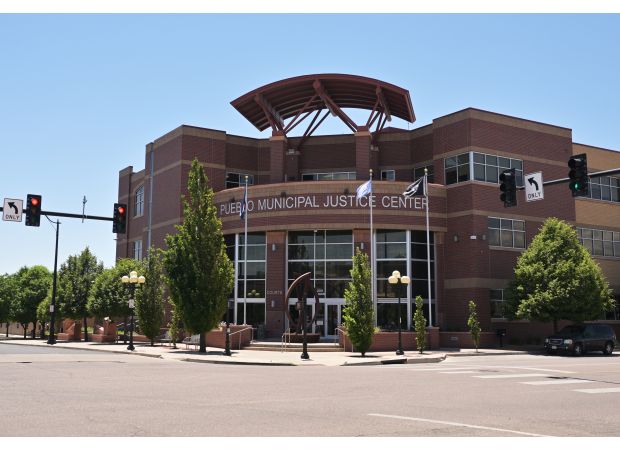 A judge declares Pueblo guilty of unlawfully imprisoning 3 individuals for contempt of court and overturns their convictions and sentences.