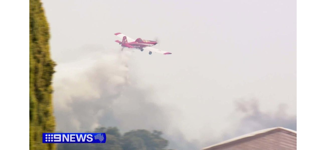 Two individuals facing charges after a nearby property was almost engulfed by a bushfire.