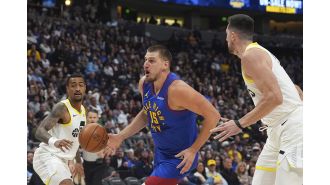 Jokic's hot third quarter helps Nuggets secure first home win against Jazz this season.