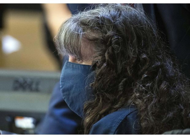 A clown who killed her husband's ex-wife is released from prison.