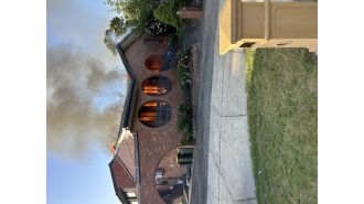 Deceased discovered following house fire in Melbourne.