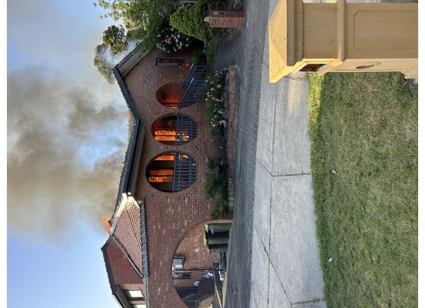 Deceased discovered following house fire in Melbourne.