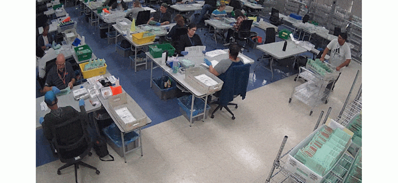 US election officials are broadcasting live video feeds of vote counting, offering transparency and security to a highly contentious process.