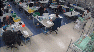 US election officials are broadcasting live video feeds of vote counting, offering transparency and security to a highly contentious process.