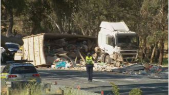 After a tragic accident, a truck driver has been charged and one person is in critical condition while two have passed away.