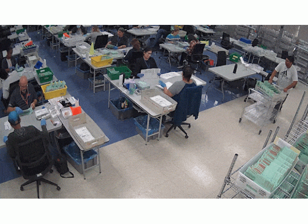 US election officials are broadcasting live video feeds of vote counting, offering transparency and security to a highly contentious process.