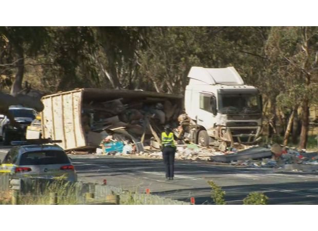 After a tragic accident, a truck driver has been charged and one person is in critical condition while two have passed away.