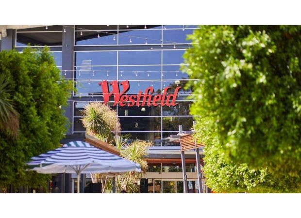 Melbourne police arrest man for stabbing three individuals near shopping center.