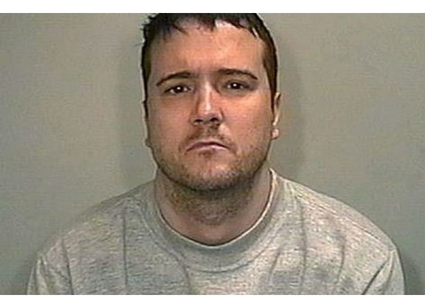 Convicted crossbow murderer assaulted by victim's acquaintance while incarcerated.