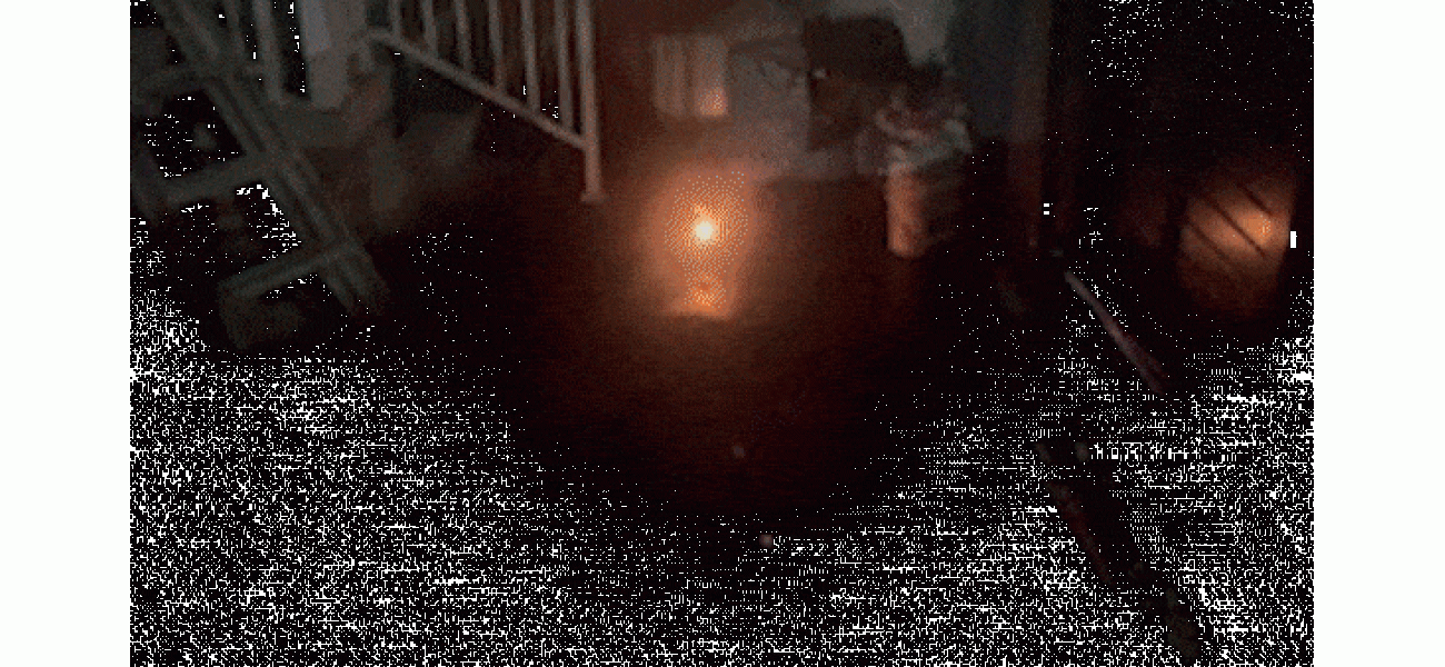 Man narrowly avoids danger as electric bike battery explodes after being tossed outside.