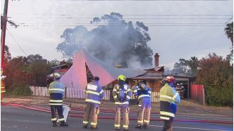 Suspicious fire destroys historic home after nearby explosion rattles residents.