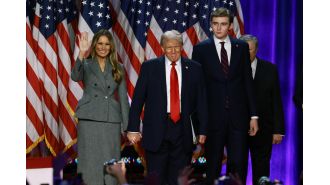 Trump explains how his son Barron has grown to be so tall, alongside his wife Melania.