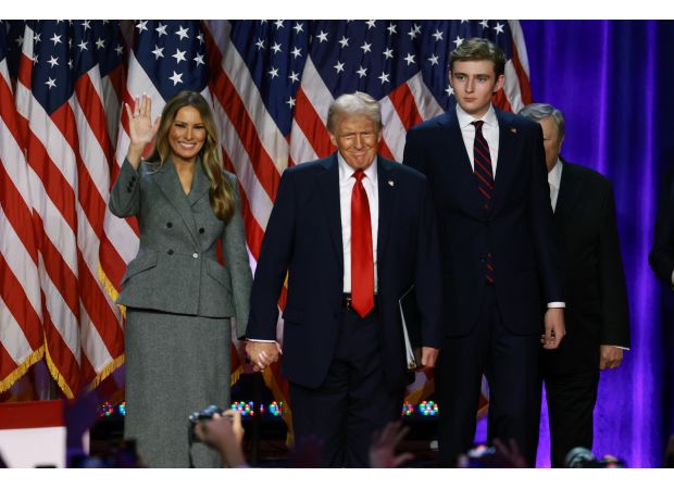 Trump explains how his son Barron has grown to be so tall, alongside his wife Melania.