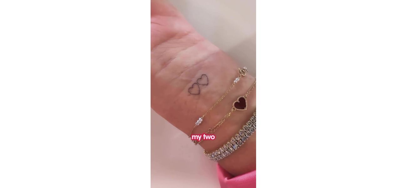 Amanda Holden got her first tattoo on a girls' trip, but her husband isn't happy about it.